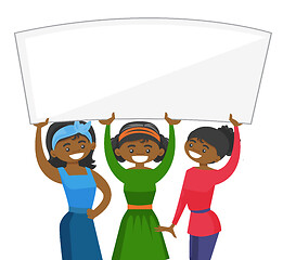 Image showing Group of young women holding white blank board.