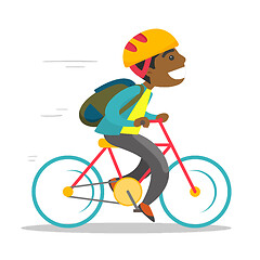 Image showing Young african-american boy riding a bicycle.