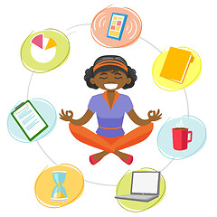 Image showing Business woman meditating in yoga lotus position.