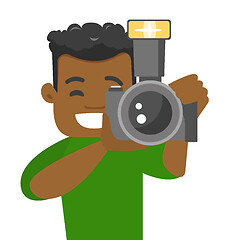 Image showing African-american photographer taking a photo.