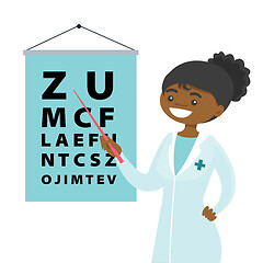 Image showing African-american ophthalmologist with eye chart.