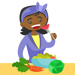 Image showing Young african woman eating healthy vegetable salad