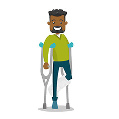 Image showing African-american man with broken leg and crutches.