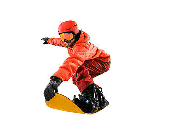 Image showing Portrait of young man in sportswear with snowboard isolated on a white background.