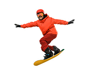 Image showing Portrait of young man in sportswear with snowboard isolated on a white background.