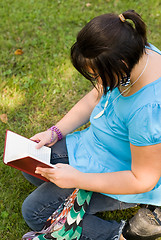 Image showing Child Reading A Novel