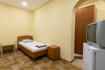 Image showing The interior of a small budget hotel room