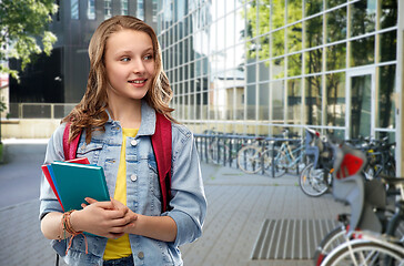 Image showing happy smiling teenage student girl with school bag