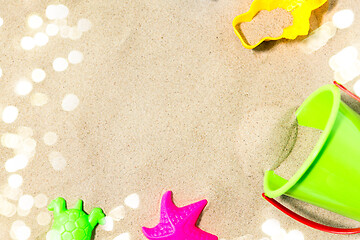 Image showing close up of sand toys kit on summer beach