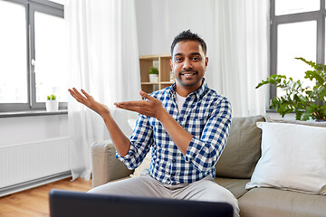 Image showing indian male blogger videoblogging at home