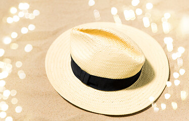 Image showing straw hat on beach sand