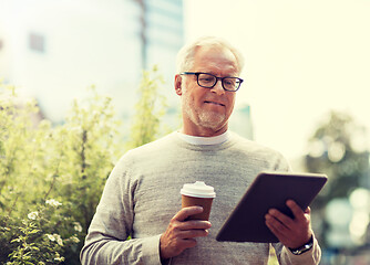 Image showing senior man with tablet pc and coffee in city