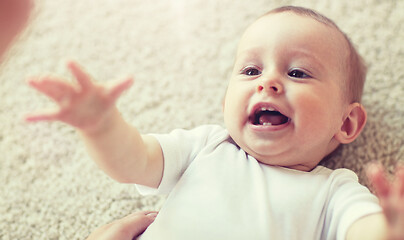 Image showing close up of happy little baby and mother