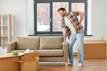 Image showing man having back ache moving to new home