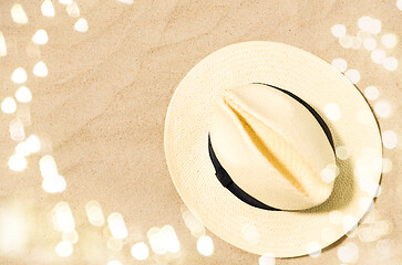 Image showing straw hat on beach sand