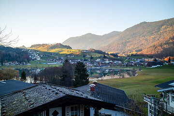 Image showing Traditional rural landscape with houses, fields and mountains in Austria.