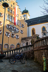 Image showing Facade of ancient historical traditional house with town flag in Kufstein city, Austria.