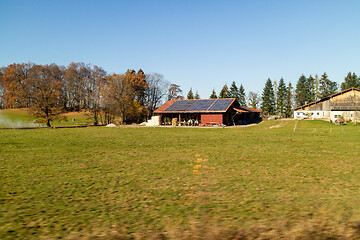 Image showing Farming lands and buildings with solar panels on the roof, Austria.