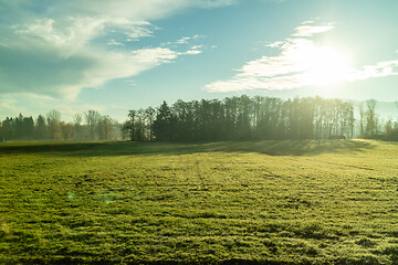 Image showing Autumn landscape with farm agricultural fields and blue sky, Austria.