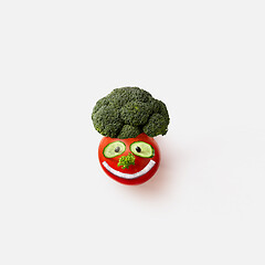 Image showing Funny smiling face made from natural organic vegetables.