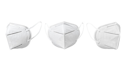 Image showing Set from medical face masks floating against white background.