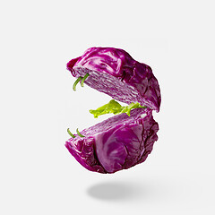 Image showing ?ut purrple cabbage as a flying open creative mouth with teeth.