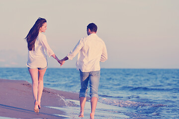 Image showing young couple  on beach have fun