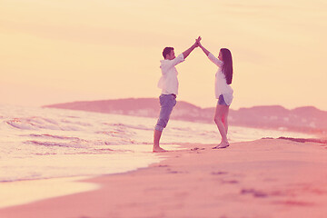 Image showing young couple  on beach have fun