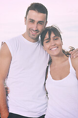 Image showing happy young couple have fun at beautiful beach