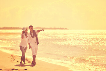 Image showing happy young couple have fun at beautiful beach