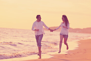 Image showing young couple  on beach have fun