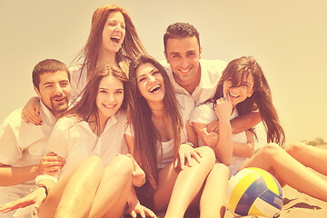 Image showing Group of happy young people in have fun at beach