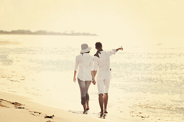 Image showing happy young couple have fun at beautiful beach