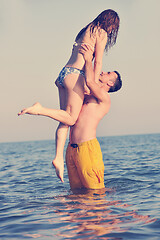 Image showing happy young couple have fun on beach