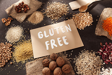 Image showing Gluten free flour and cereals millet, quinoa, corn bread, brown buckwheat, rice with text gluten free