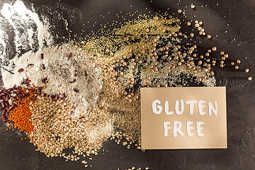 Image showing Gluten free flour and cereals millet, quinoa, corn bread, brown buckwheat, rice with text gluten free