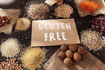 Image showing Gluten free flour and cereals millet, quinoa, corn bread, brown buckwheat, rice with text gluten free