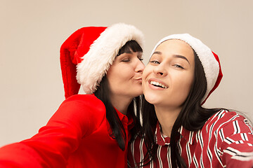 Image showing A portrait of a happy mother and daughter