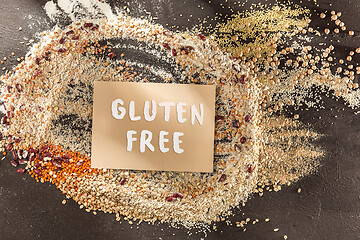 Image showing Gluten free flour and cereals millet, quinoa, corn bread, brown buckwheat, rice with text gluten free