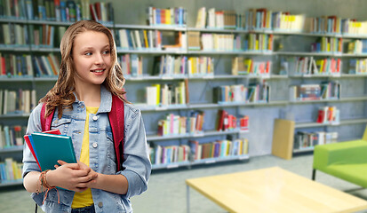 Image showing teenage student girl with books at school library