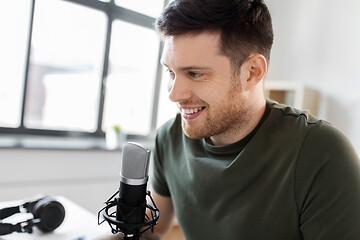 Image showing close up of blogger with microphone audio blogging