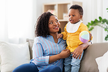 Image showing mother and baby with ball at home