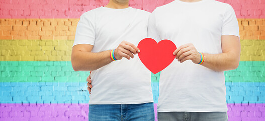 Image showing couple with gay pride rainbow wristbands and heart