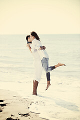 Image showing happy young couple have fun at beautiful beach