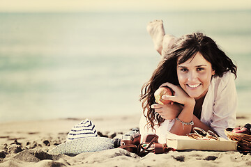 Image showing happy young woman on beach