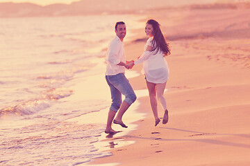 Image showing young couple  on beach have fun