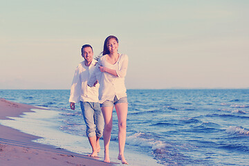 Image showing young couple  on beach have fun