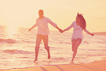 Image showing young couple  on beach have fun