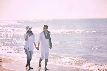 Image showing happy young couple have fun at beautiful beach