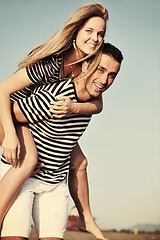 Image showing happy young couple have romantic time on beach